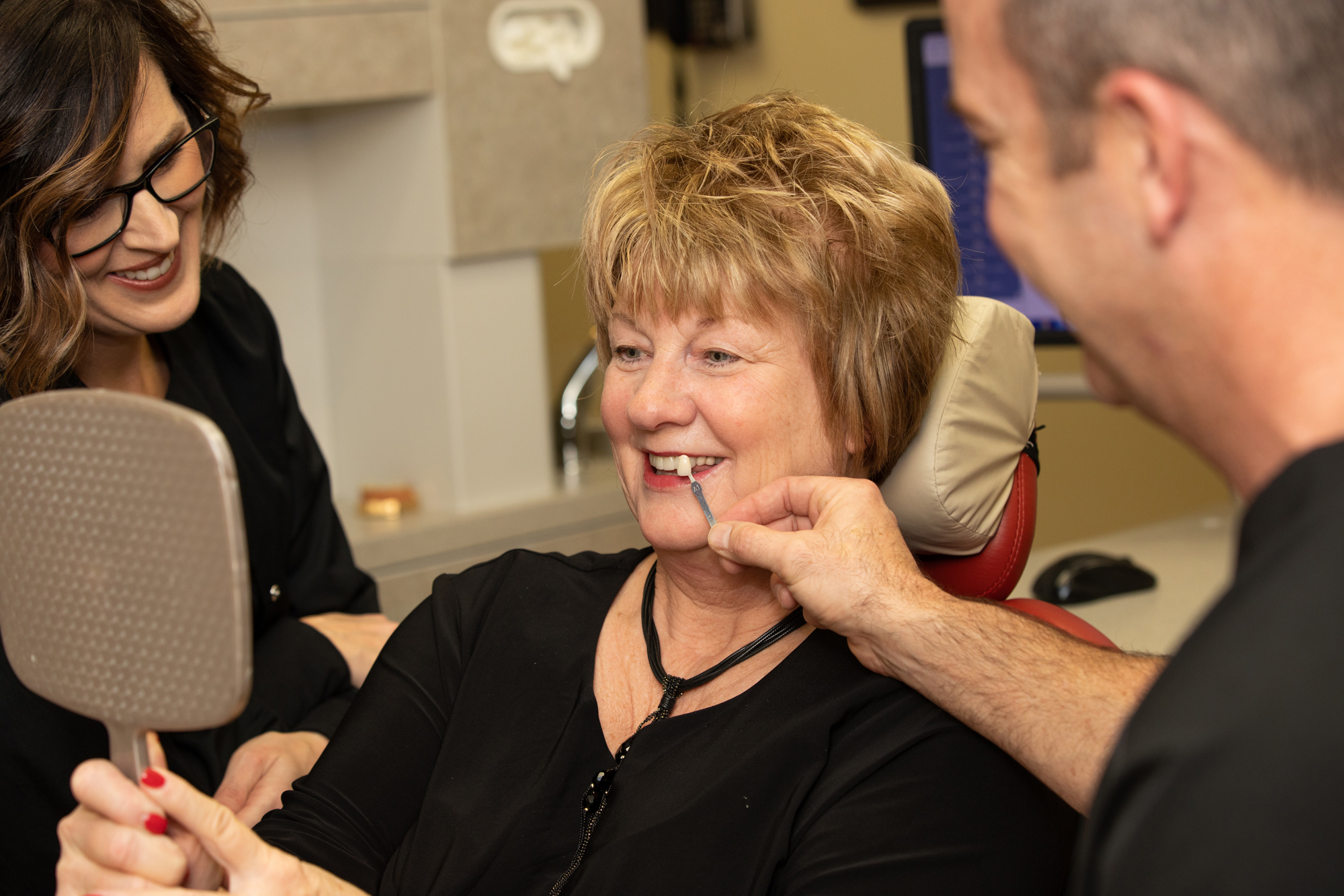 Our staff preview veneers with patient